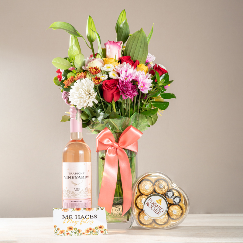 Arreglo de flores variadas entre rosas y geberas con vino rosado y chocolates ferrero rocher de corazón. regalos en bogota, flores en bogotá, flores en colombia, flores a domicilio en bogota, regalos a domicilio en bogota