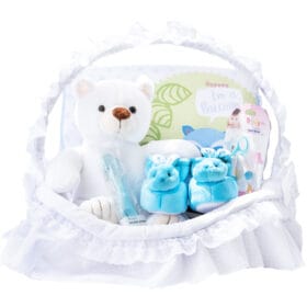 Canastilla para niño con oso de peluche cuchara de silicona y babuchas