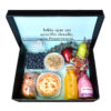 Desayuno sorpresa en caja para regalar con jugo, champaña, fruta y panecillo