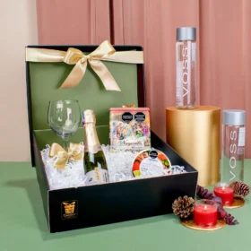 Ancheta navideña para regalar con vino espumoso Chandon, agua Voss con copa y truffas gourmet nayarith