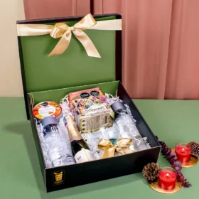 Ancheta navideña para regalar con vino espumoso Chandon, agua Voss con copa y truffas gourmet nayarith